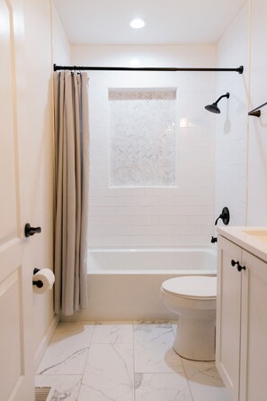 Hair dryer, towels, soap, toilet paper