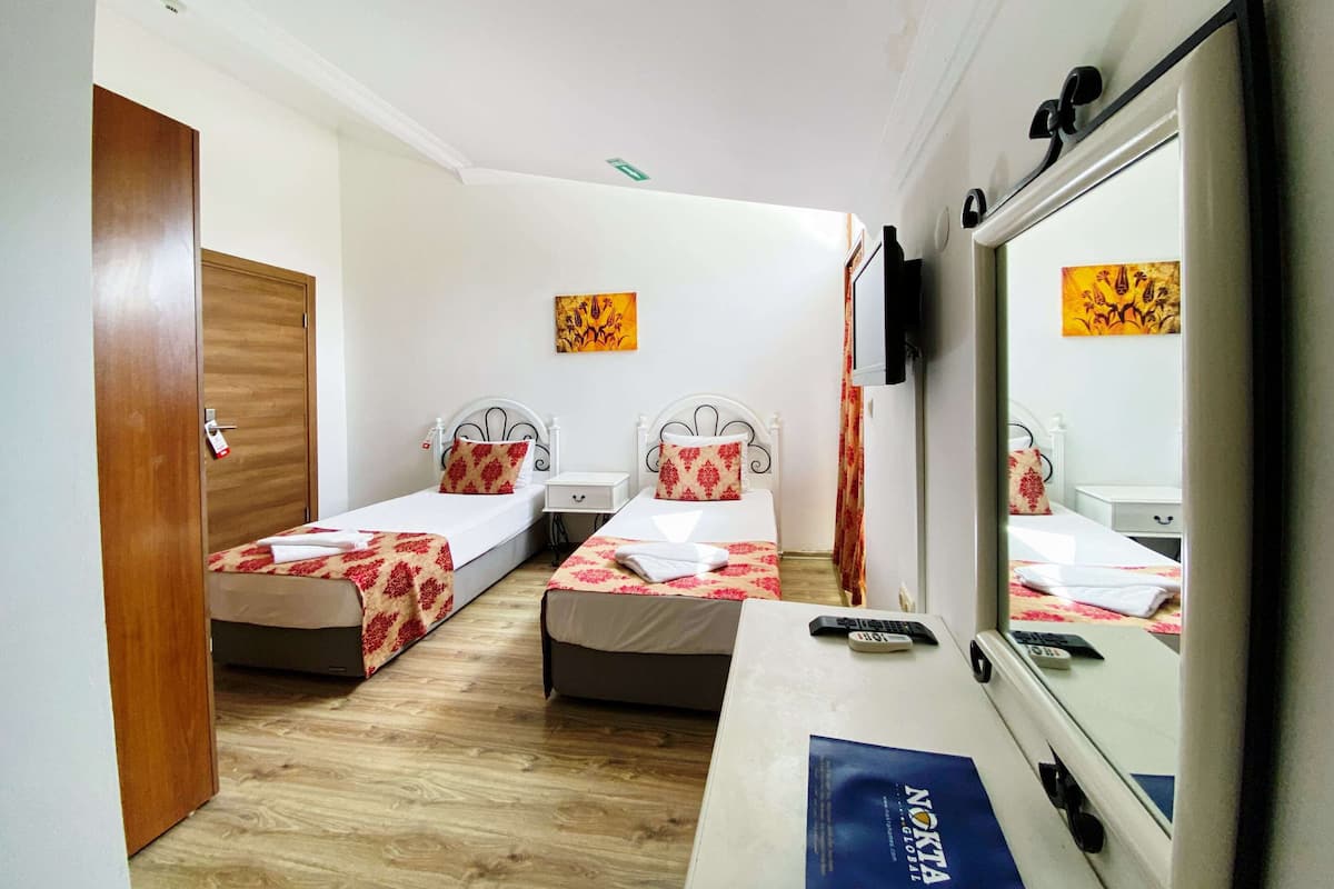 Family Quadruple Room | Desk, bed sheets