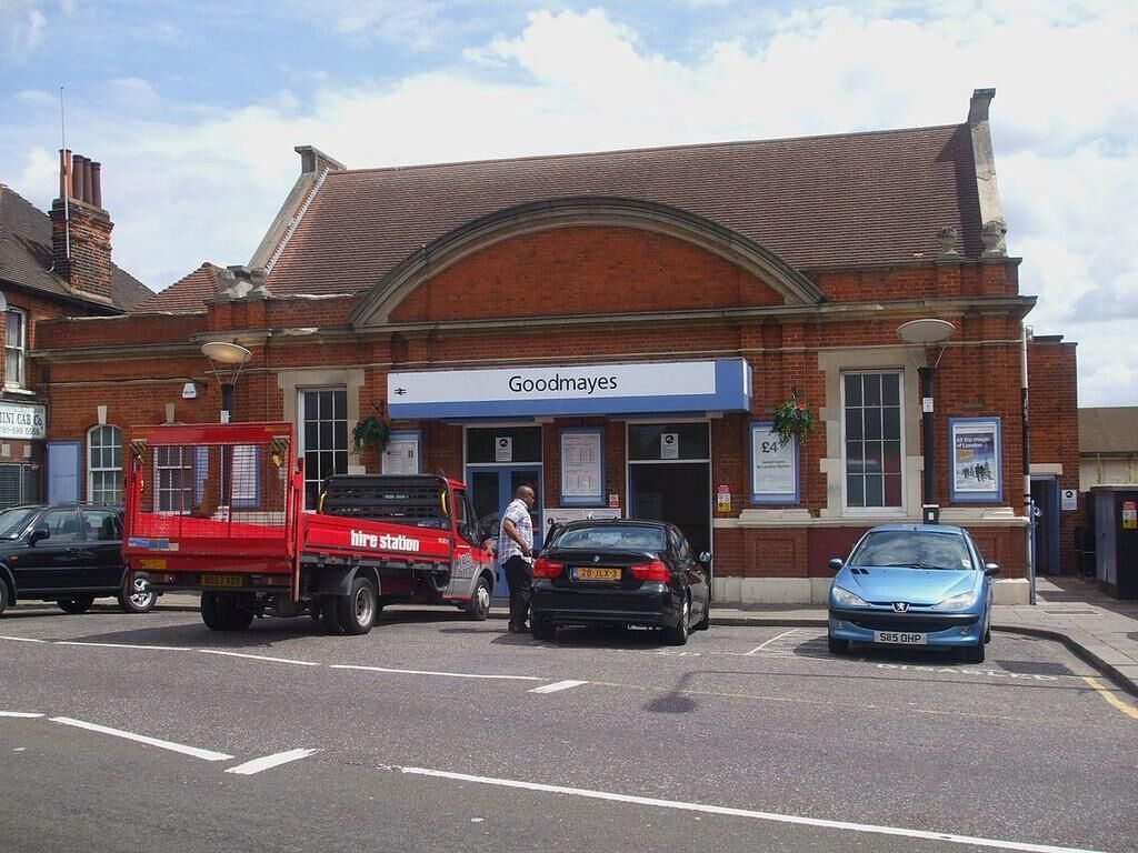 A brick building with a sign reading "Goodmayes."