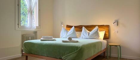 1 bedroom, desk, iron/ironing board, travel cot