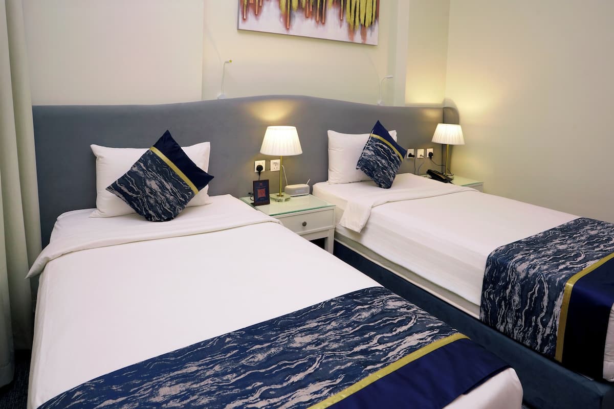 Twin Room | Egyptian cotton sheets, premium bedding, pillow-top beds, in-room safe