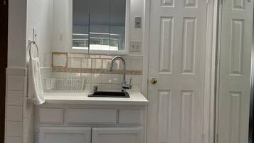 Shower, towels, soap, shampoo