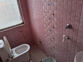 Deluxe Single Room, City View | Bathroom | Shower, slippers, soap, shampoo