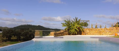 2 outdoor pools, pool umbrellas, pool loungers