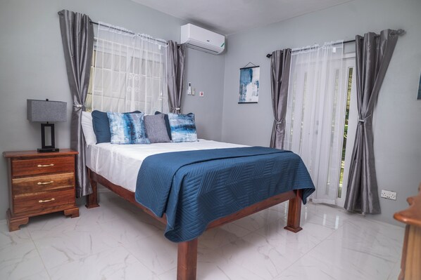 Deluxe House, Garden View | 3 bedrooms, blackout curtains, iron/ironing board, free WiFi - RVR Rentals (Montego Bay)