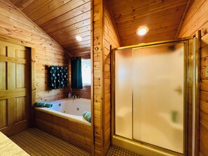 Jetted tub, hair dryer, towels, soap