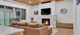 Modern home with 2 master bedrooms, private hot tub, garage and mountain views