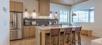 Modern home with 2 master bedrooms, private hot tub, garage and mountain views