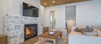 Modern home with 2 master bedrooms, private hot tub, garage and mountain views