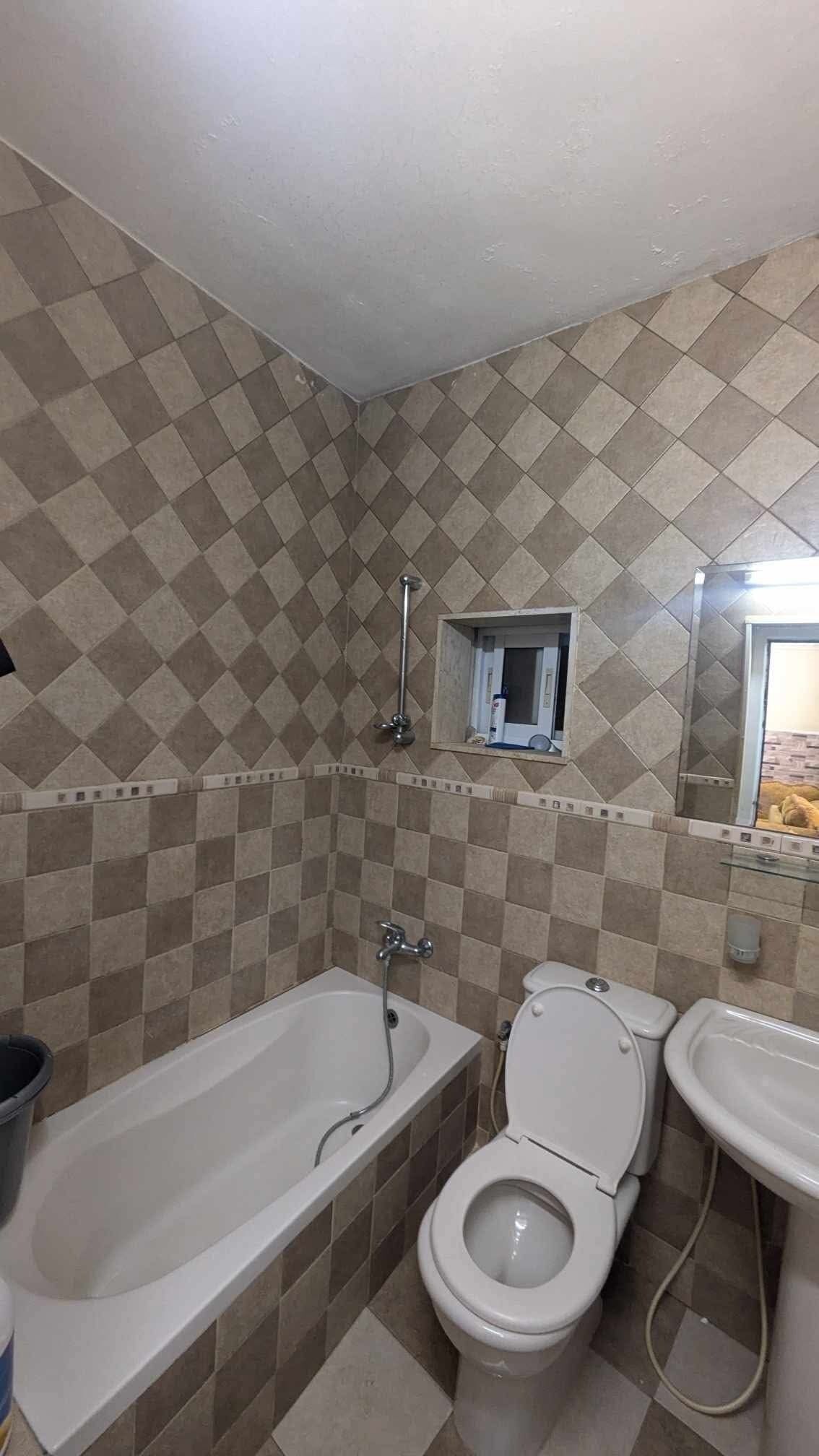 Bidet, towels, soap, toilet paper