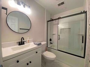 Hair dryer, towels, soap, toilet paper