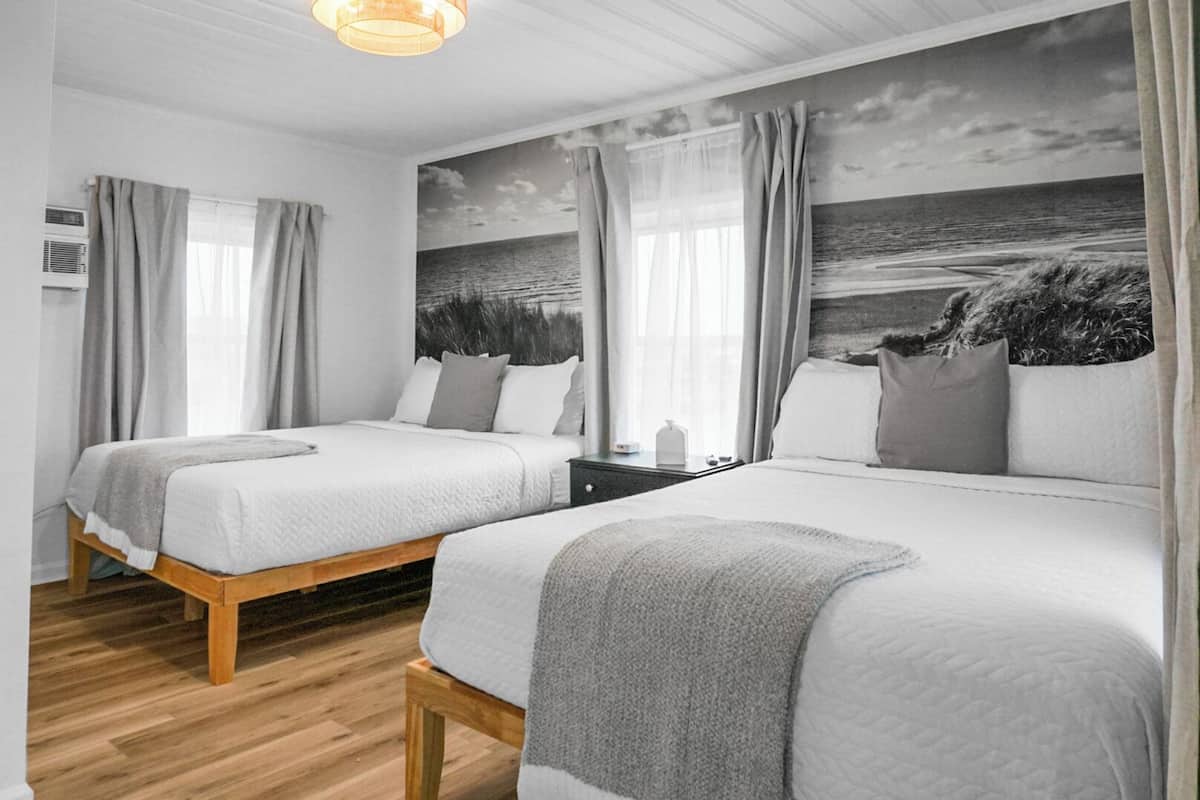 Suite estudio Confort, 2 camas Queen size, vista parcial al océano, frente al mar | Wifi gratis y ropa de cama