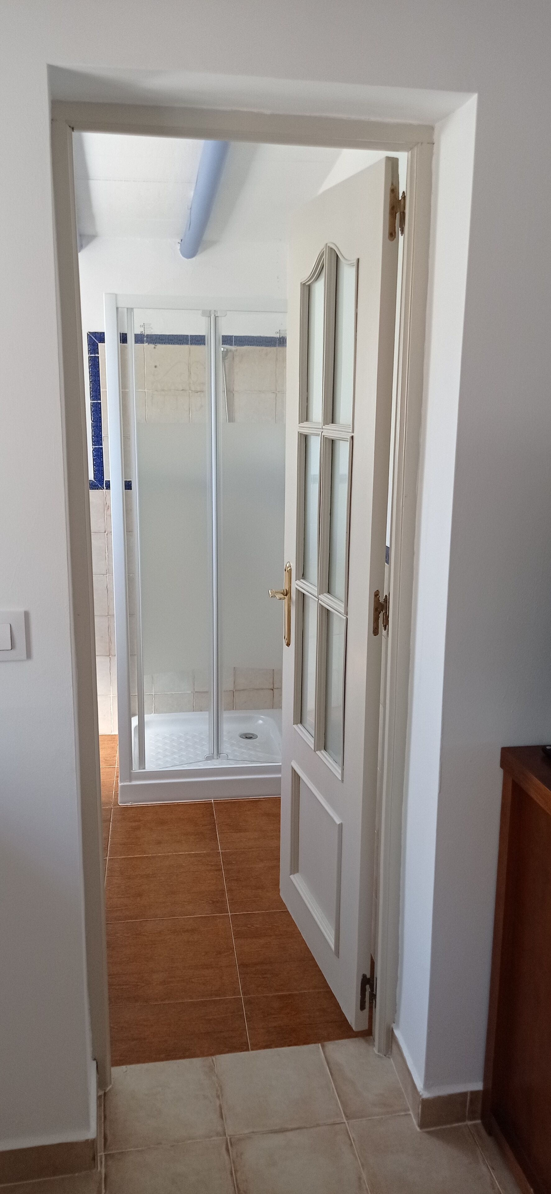 Family Triple Room, Garden View | Bathroom | Shower, hair dryer, towels, toilet paper