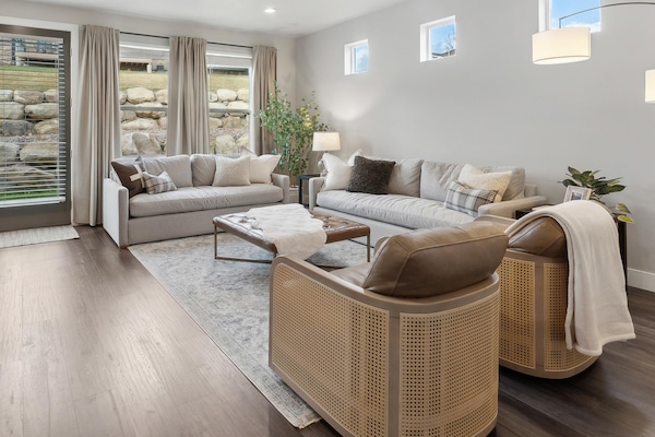 Comfort meets style in the Gather Room with plush seating and mountain-inspired décor.