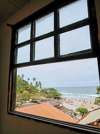 Habitación económica doble de uso individual, vistas al mar | Ropa de cama. Hostel Interligado