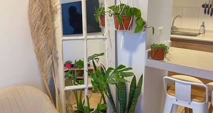 Boho chic style apartment, 4 people 200 m from La Cisterna subway + parking lot