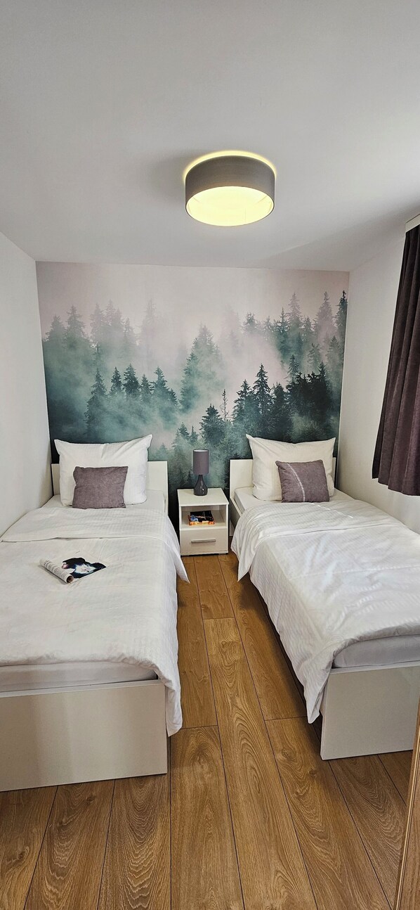 2 chambres, fer et planche à repasser, Wi-Fi, draps fournis