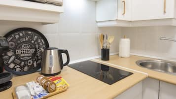 Fridge, microwave, coffee/tea maker, toaster