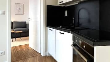 Comfort Apartment, Garden View | Private kitchen | Full-size fridge, microwave, oven, stovetop