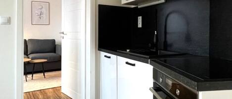 Comfort Apartment, Garden View | Private kitchen | Full-size fridge, microwave, oven, stovetop