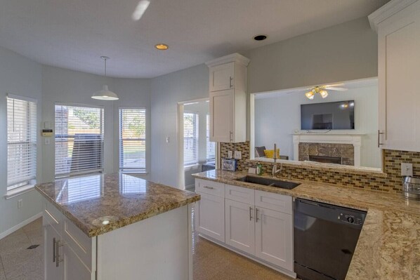 Fridge, microwave, dishwasher, cookware/dishes/utensils