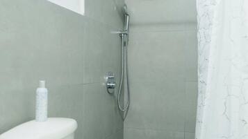 Hair dryer, towels, soap, shampoo