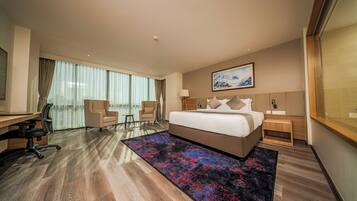 Suite, 1 King Bed, Non Smoking, Jetted Tub | Premium bedding, minibar, in-room safe, desk