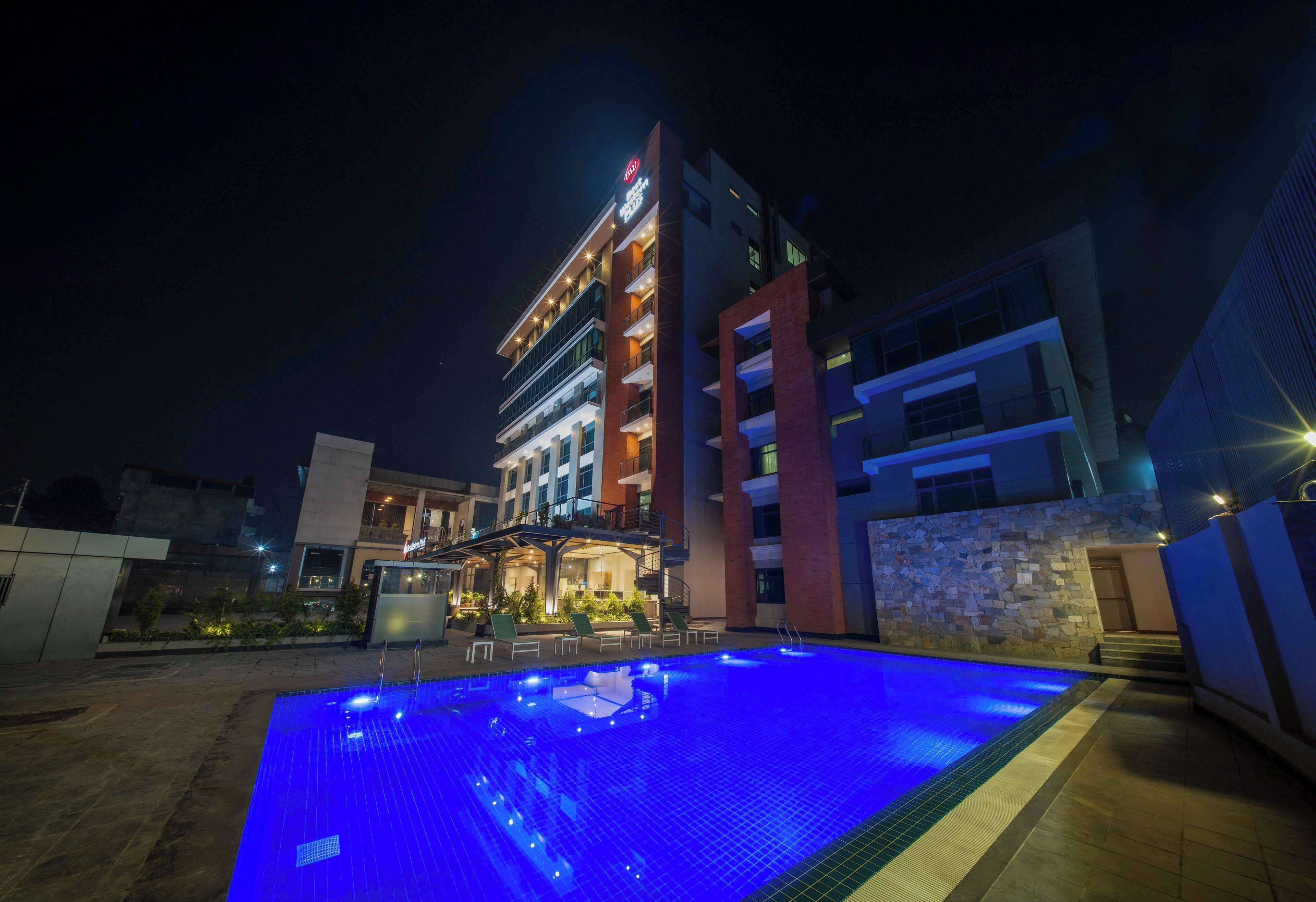 Outdoor pool, pool umbrellas, pool loungers