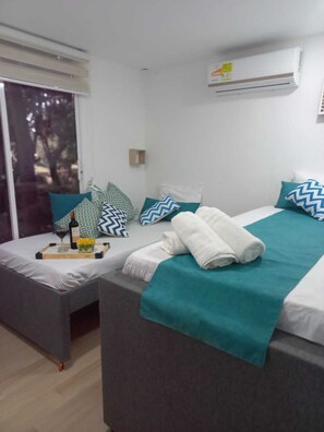 2 dormitorios, tabla de planchar con plancha, wifi y ropa de cama