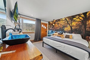 Room, 1 King Bed | In-room safe, blackout drapes, WiFi (free), individually decorated