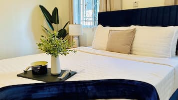1 habitación, tabla de planchar con plancha, wifi y ropa de cama