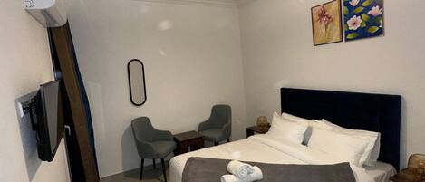 2 dormitorios, tabla de planchar con plancha, wifi y ropa de cama