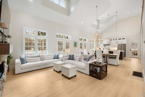 Smart TV, fireplace, table tennis, books - Hydrangea Hideaway: 236-O Luxurious Orleans Estate w/Pool, Cabana, Game Room, and Stunning Finishes (Orleans)