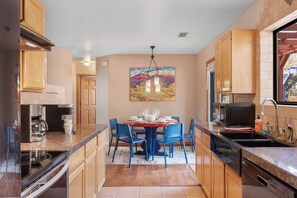 Fridge, microwave, oven, stovetop - Discover luxury at Sedona Flow, a spacious 3-bedroom home in West Sedona with stunning garden views. (Sedona)