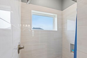 Shower, towels - Canal Front | Gated Community, Firepit & Decks (Port Bolivar)
