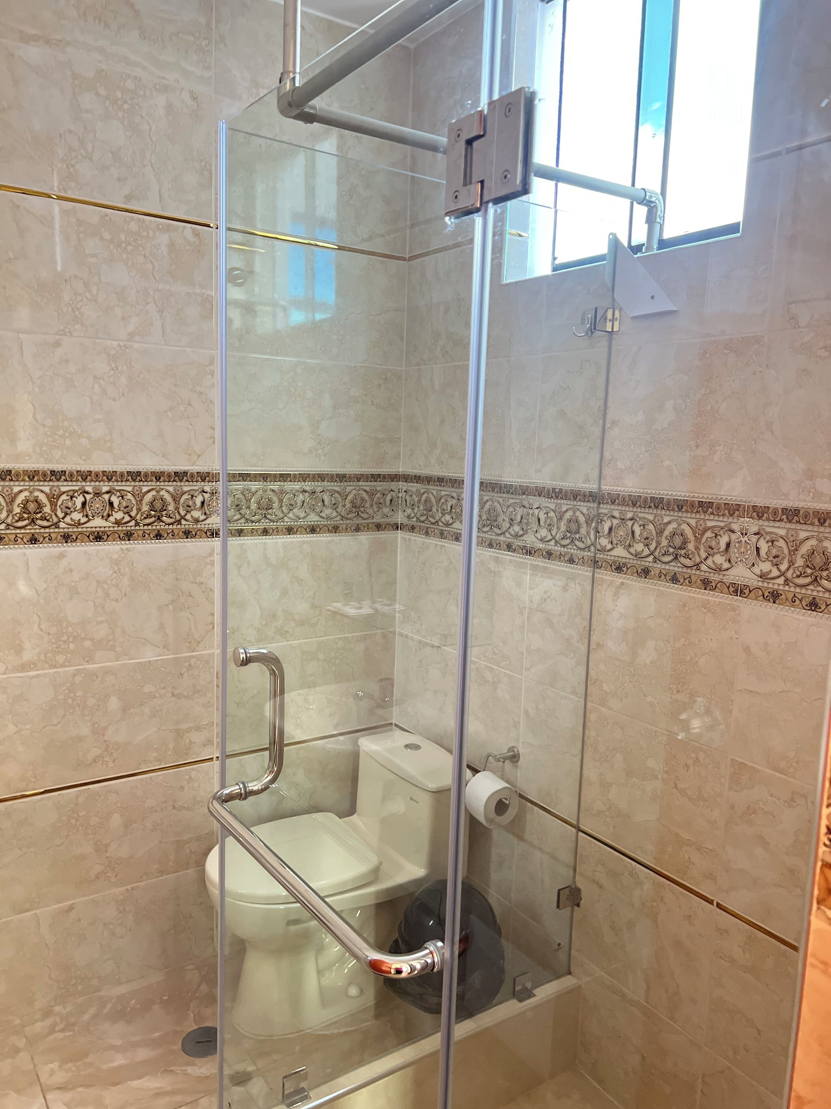 Shower, towels, soap, shampoo