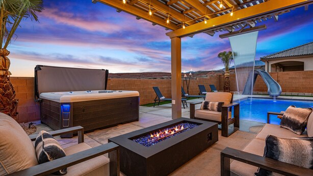 An outdoor patio with a fire pit, lounge chairs, and a pool. - Crimson Ridge 1373, SLP 20, Private Pool, Game Room, Mountain Views, and Resort Access (Washington)