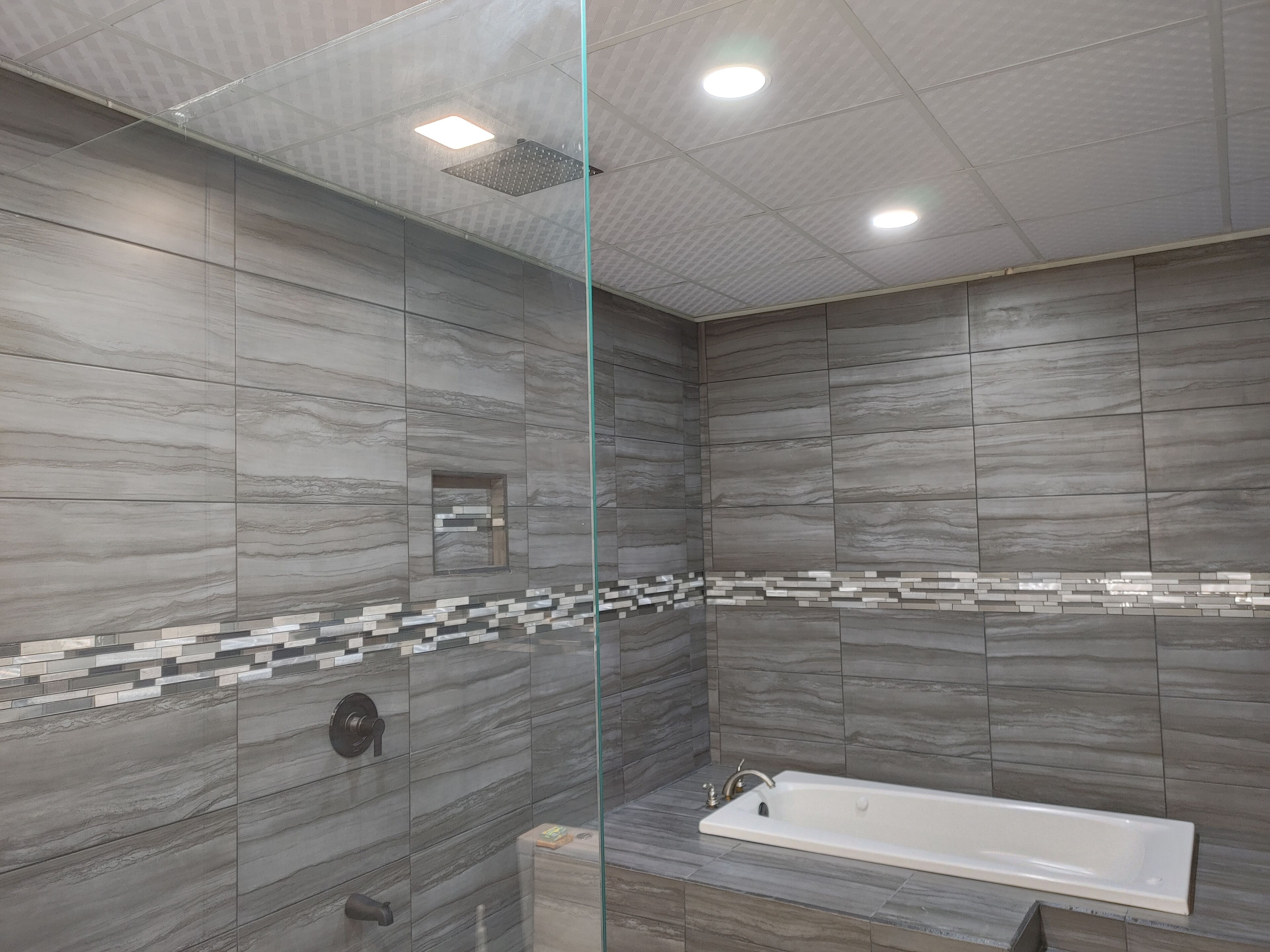 Shower, jetted tub, towels, soap