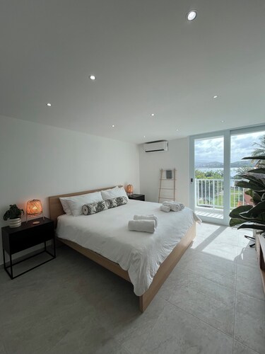 Private Island 1BR Condo with Oceanview, Pool View, 500MB WiFi & A/C