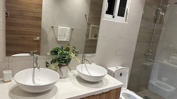 Shower, free toiletries, towels, soap