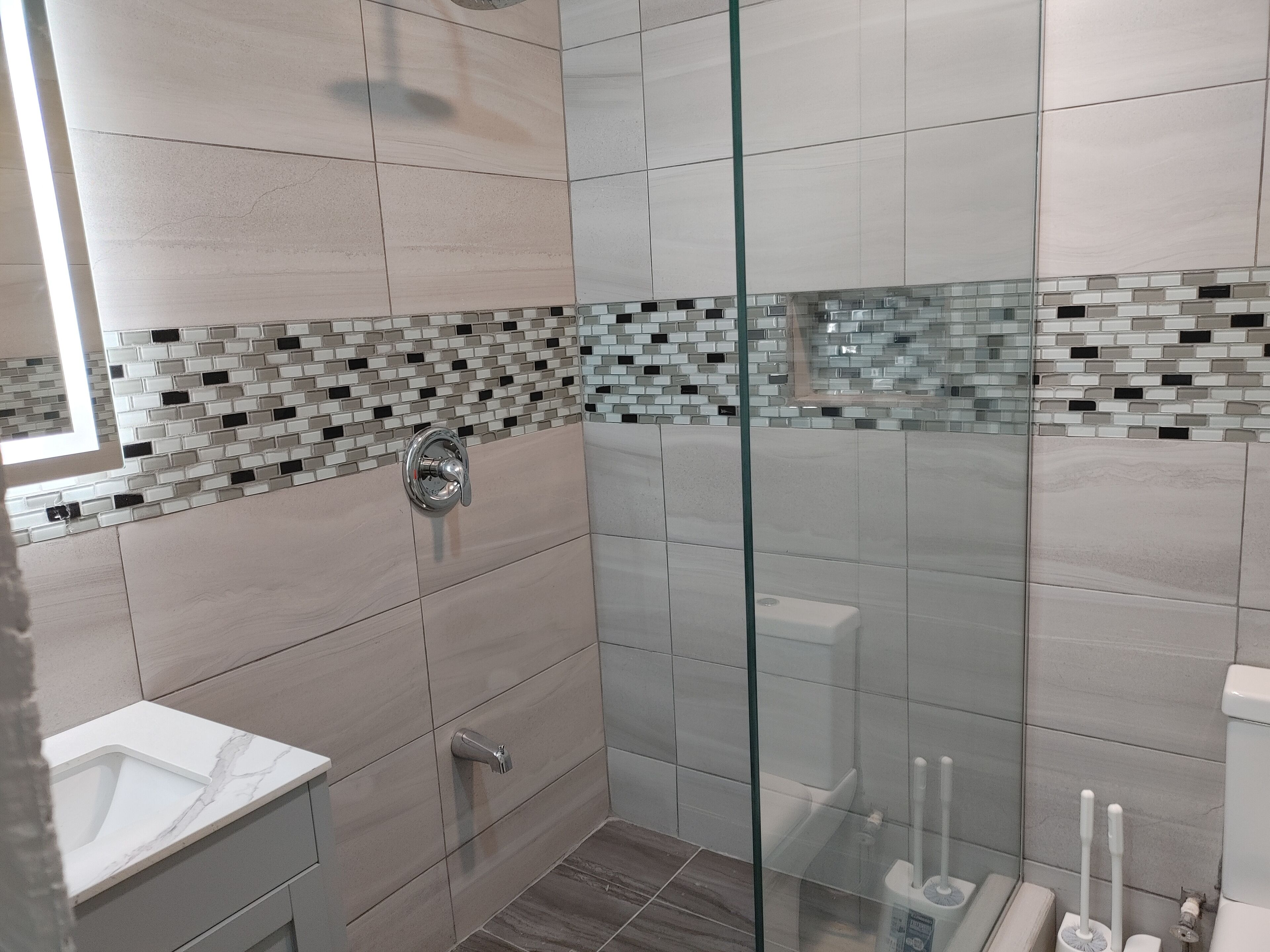 Shower, towels, soap, toilet paper