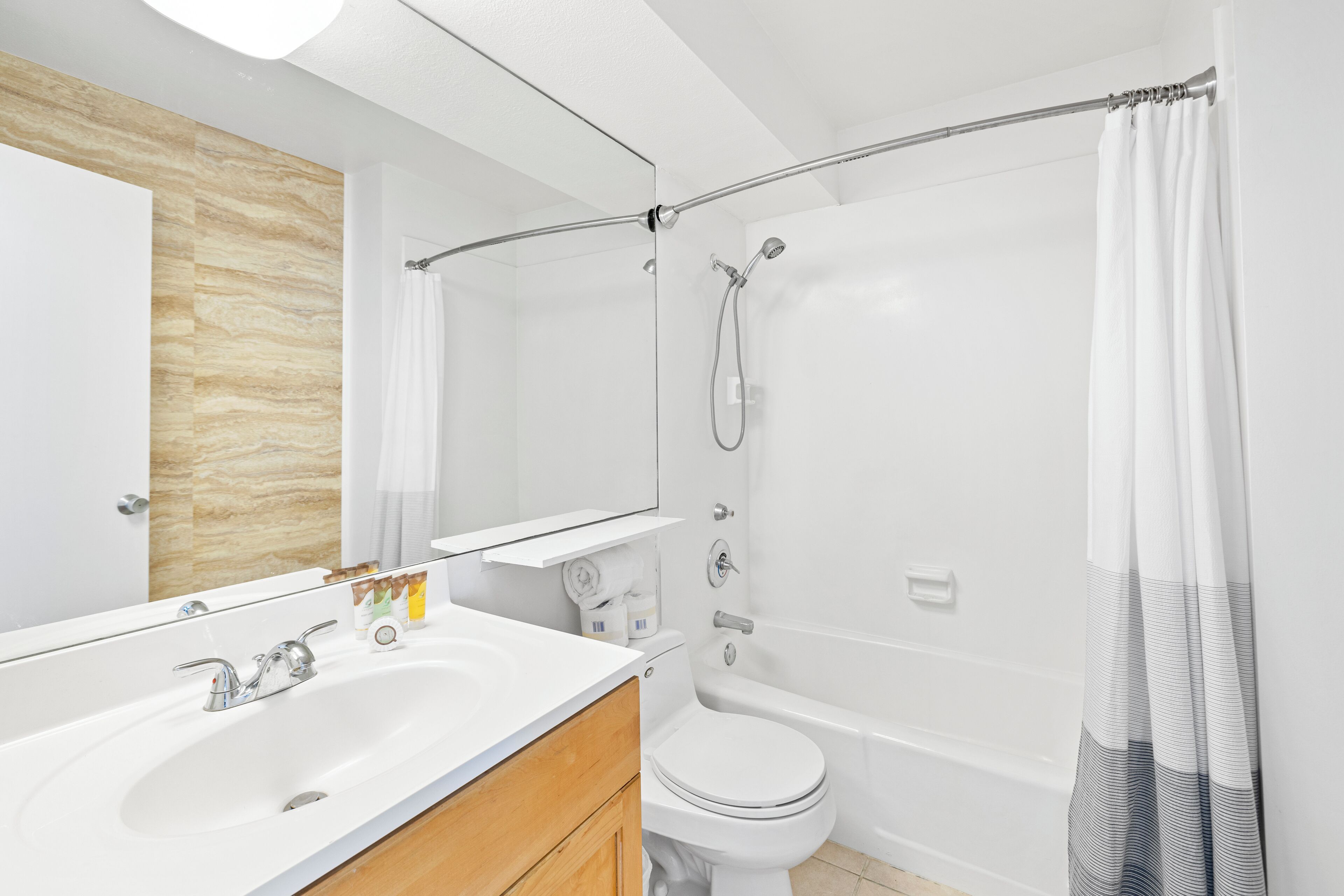 Hair dryer, towels, soap, shampoo