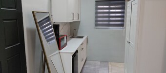 Tranquility Hotel Suite RD, walking distance to the QPS, Ariapita Ave, & EV Zoo,