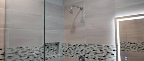 Shower, towels, soap, toilet paper