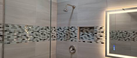 Shower, towels, soap, toilet paper