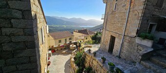 Typical T2 in the heart of the village with view of the Gulf