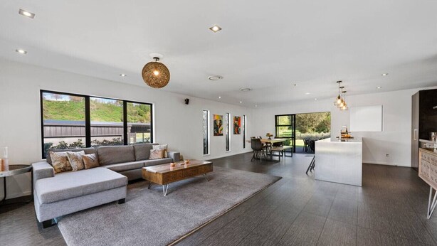 Living area - Riverside in private gated community, with spa pool  & WI-FI, large outdoor area including outdoor , BBQ and alfresco dining, outdoor. Direct access to the river.  Trampoline and ping pong table to keep the  young ( and not so young) entertained. (Taupō)