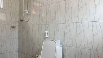 Shower, slippers, bidet, towels