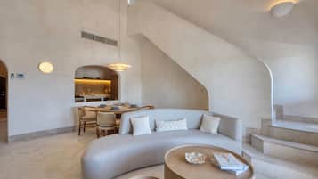 Deluxe Penthouse, 2 Bedrooms, Balcony | Living room | 55-inch Smart TV with digital channels, foosball, table tennis