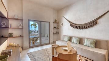 Deluxe Apartment, 3 Bedrooms, Terrace | Living room | 55-inch Smart TV with cable channels, table football, ping pong